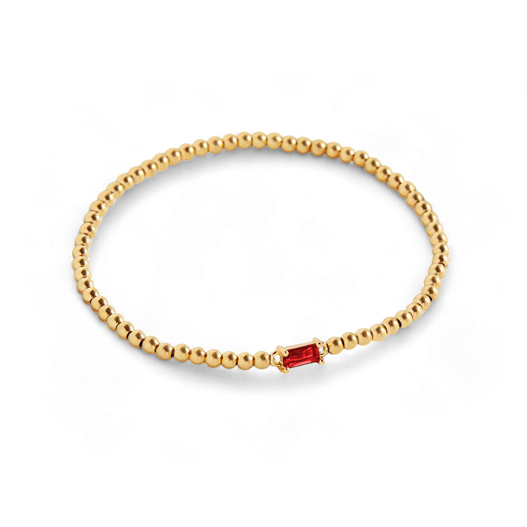 Bracelet of gold beads with birth stone